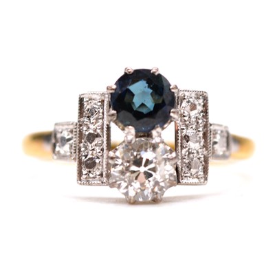 Lot 62A - A sapphire and diamond two stone ring.