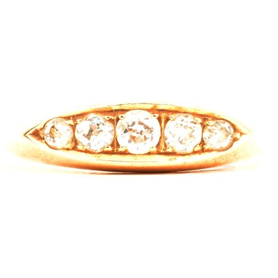 Lot 102 - A diamond five stone ring.