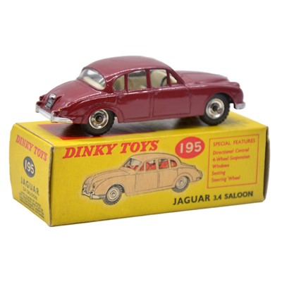 Lot 8 - Dinky Toys model 195 Jaguar 3.4 Saloon, dark red body, spun hubs, boxed.