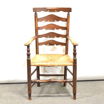 Lot 415 - Victorian elm and ash ladder back elbow chair