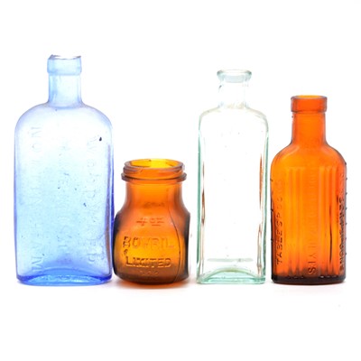Lot 69 - Small quantity of vintage glass chemists bottles and others.