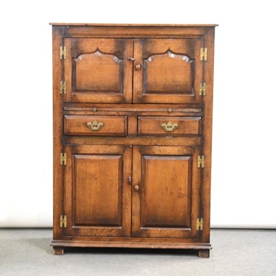 Lot 355 - Oak drinks cabinet by Titchmarsh & Goodwin