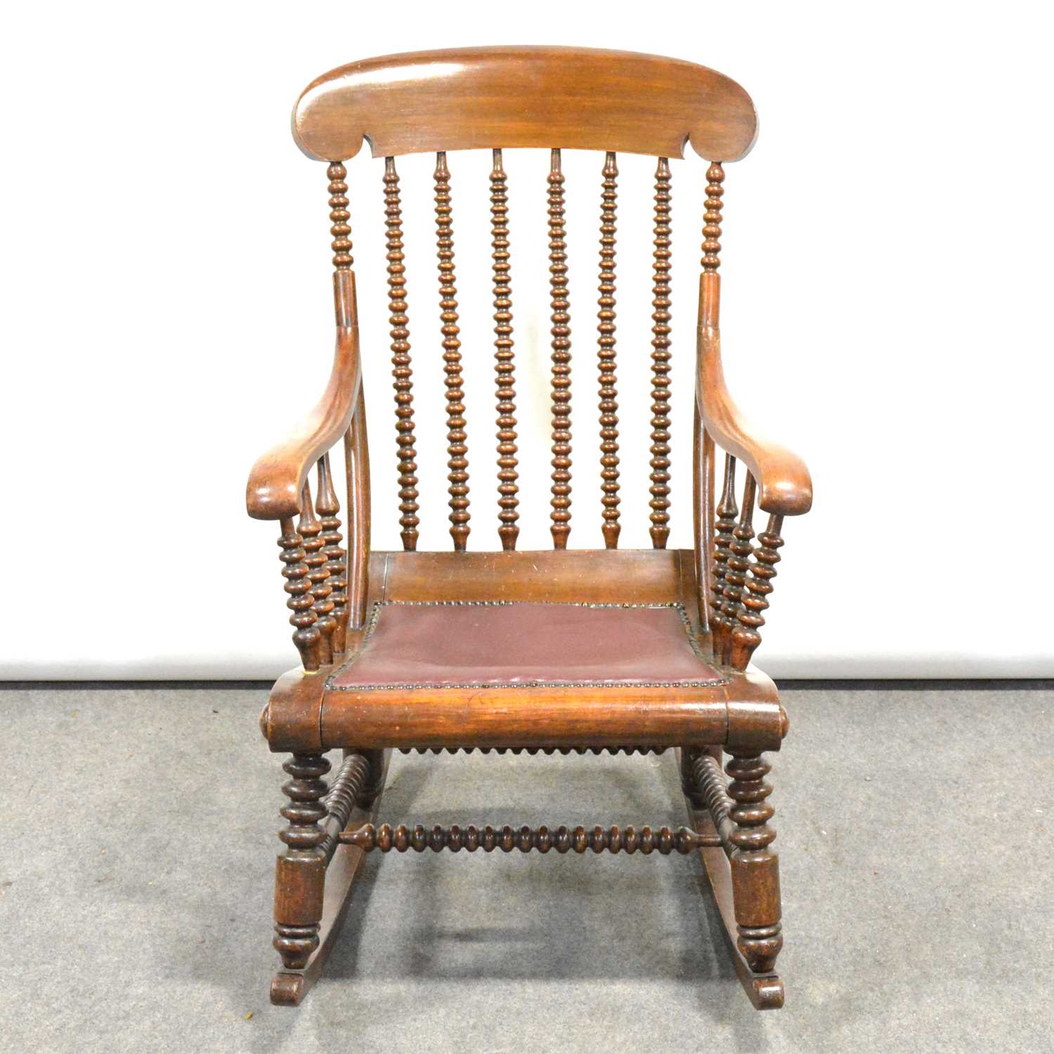 Lot 583 - Beech framed rocking chair,