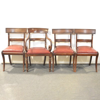 Lot 379 - Set of four William IV sabre leg dining chairs