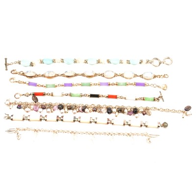 Lot 207 - Seven gemset and plain silver bracelets, jadeite, moonstone, mother-of-pearl and others.