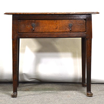 Lot 480 - George III oak lowboy