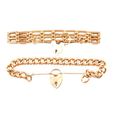 Lot 268 - A yellow metal curb link bracelet and a 9 carat yellow gold gate link bracelet.