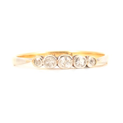 Lot 99 - A diamond five stone ring.