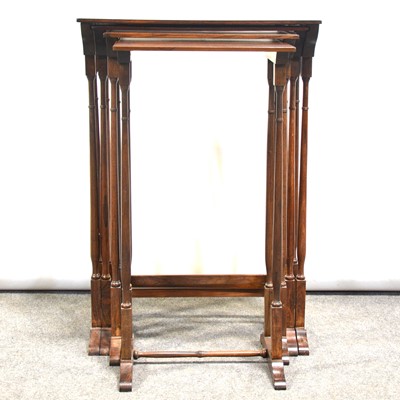 Lot 409 - Nest of four rosewood and specimen wood quartetto tables