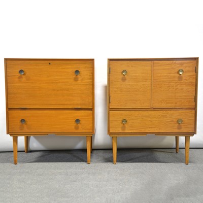 Lot 412 - English Mid-Century teak cocktail cabinet and a similar cabinet