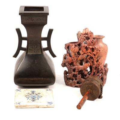 Lot 38 - A Tibetan prayer wheel, soapstone carving, bronze type vase, blue and white tile.