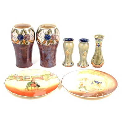 Lot 37 - Two pairs of Doulton glazed stoneware vases and a single vase, two series ware plates.