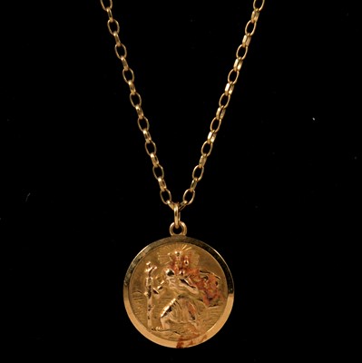 Lot 203 - A 9 carat yellow gold St Christopher, yellow metal chain, bracelet and pendant.