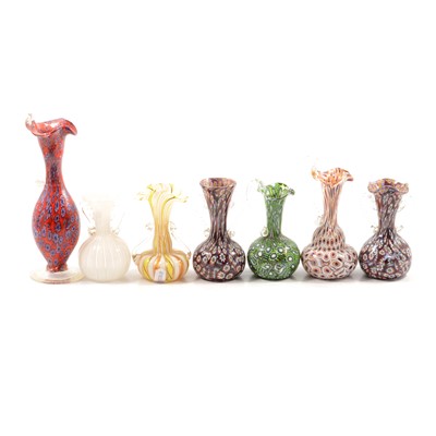 Lot 23 - Five millefiori jugs/vases, two other glass Murano style vases.