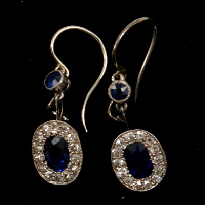 Lot 295 - A pair of sapphire and diamond earrings.