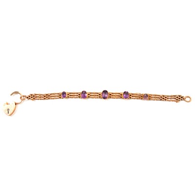 Lot 251 - An amethyst gate link bracelet.