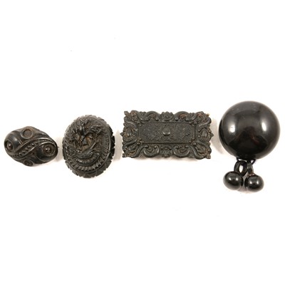 Lot 478A - Thirteen mixed material jet style brooches, bracelet panel and half belt buckle.