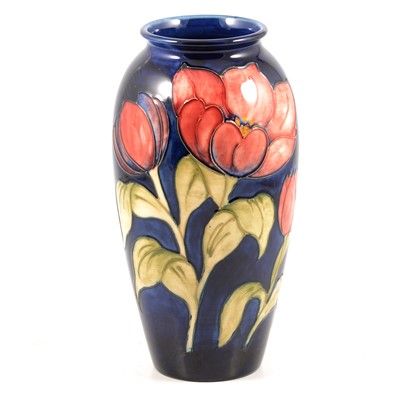 Lot 24 - Walter Moorcroft for Moorcroft  Pottery, an ovoid vase in the Tulips design.