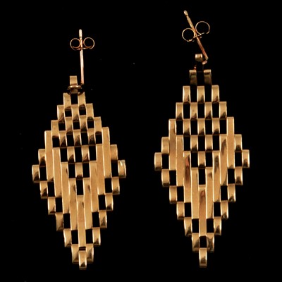 Lot 299 - A pair of 9 carat yellow gold earrings.