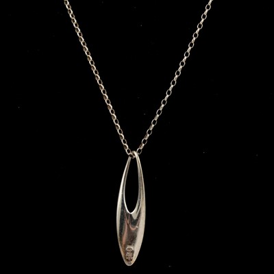 Lot 405 - Regitze Overgaard for Georg Jensen - a silver Zephyr pendant and chain numbered 500.