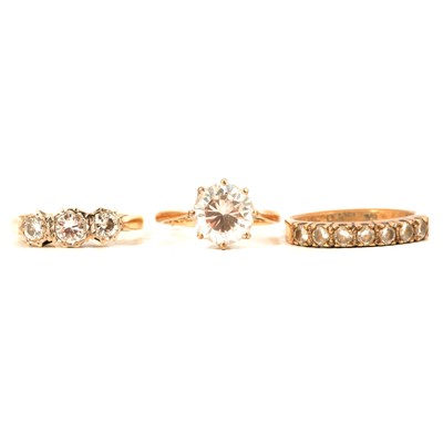 Lot 85 - Three gemset rings, diamond and cubic zirconia.