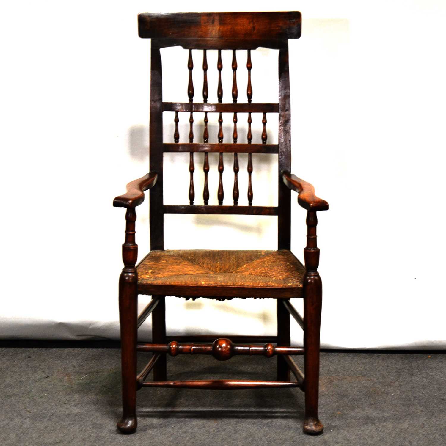 Lot 461 19th Century high spindle back elbow chair,