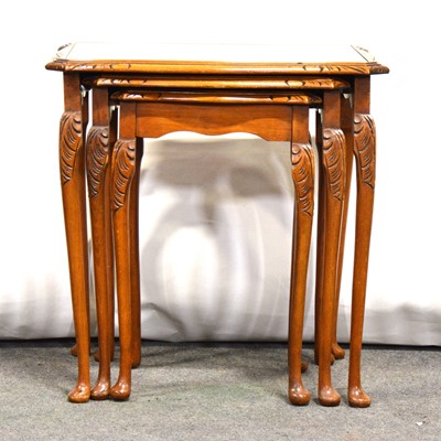 Lot 451 - Nest of three walnut occasional table