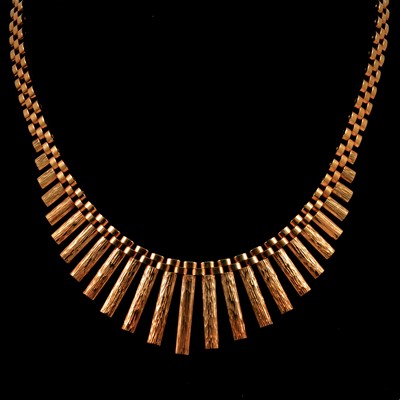 Lot 162 - A 1970's vintage 9 carat yellow gold fringe necklace.