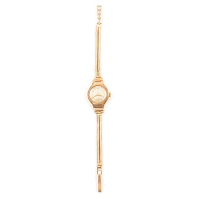 Lot 382 - A lady's 9 carat yellow gold bracelet wristwatch.