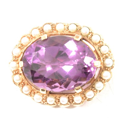 Lot 220 - An amethyst and pearl brooch.