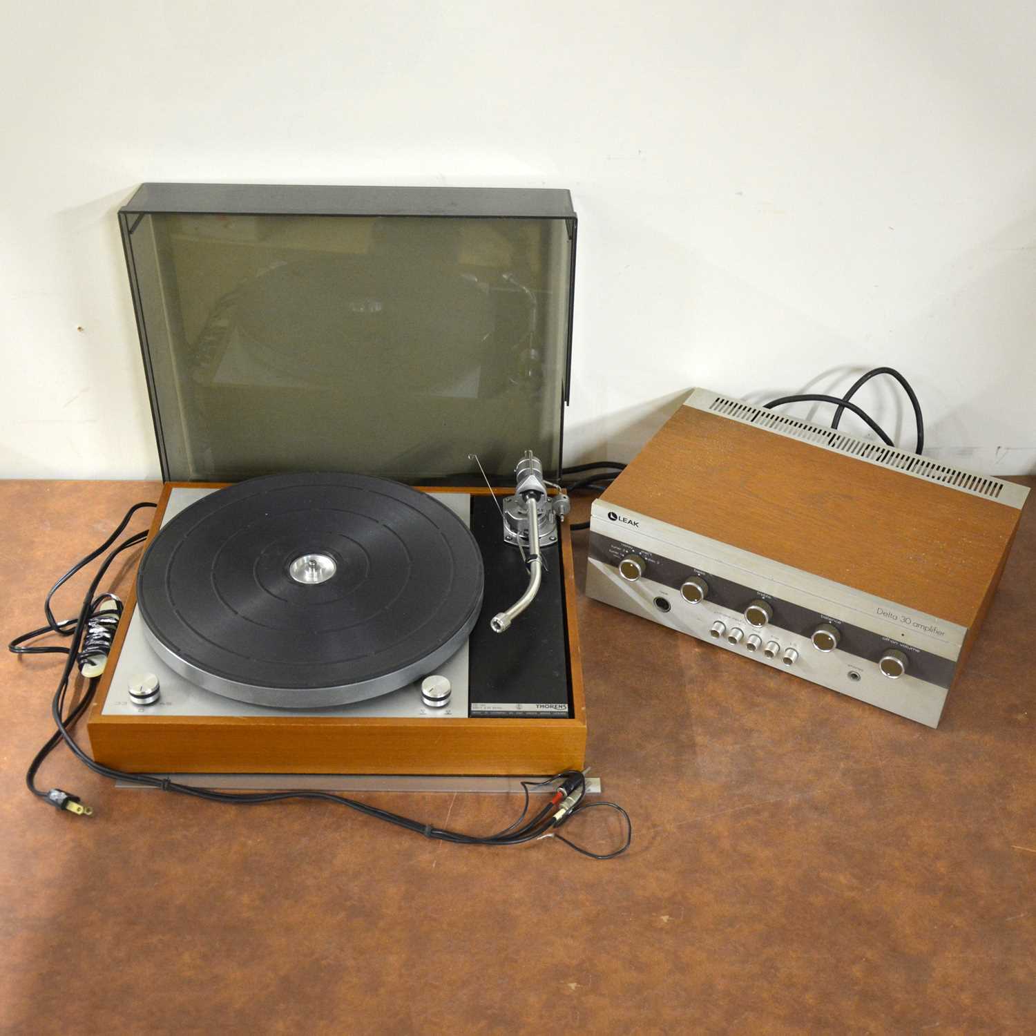 Lot 143 - Thorens TD-150 turntable vinyl record player, with spare lid, boxed; and a Leak Delta 30 amp.