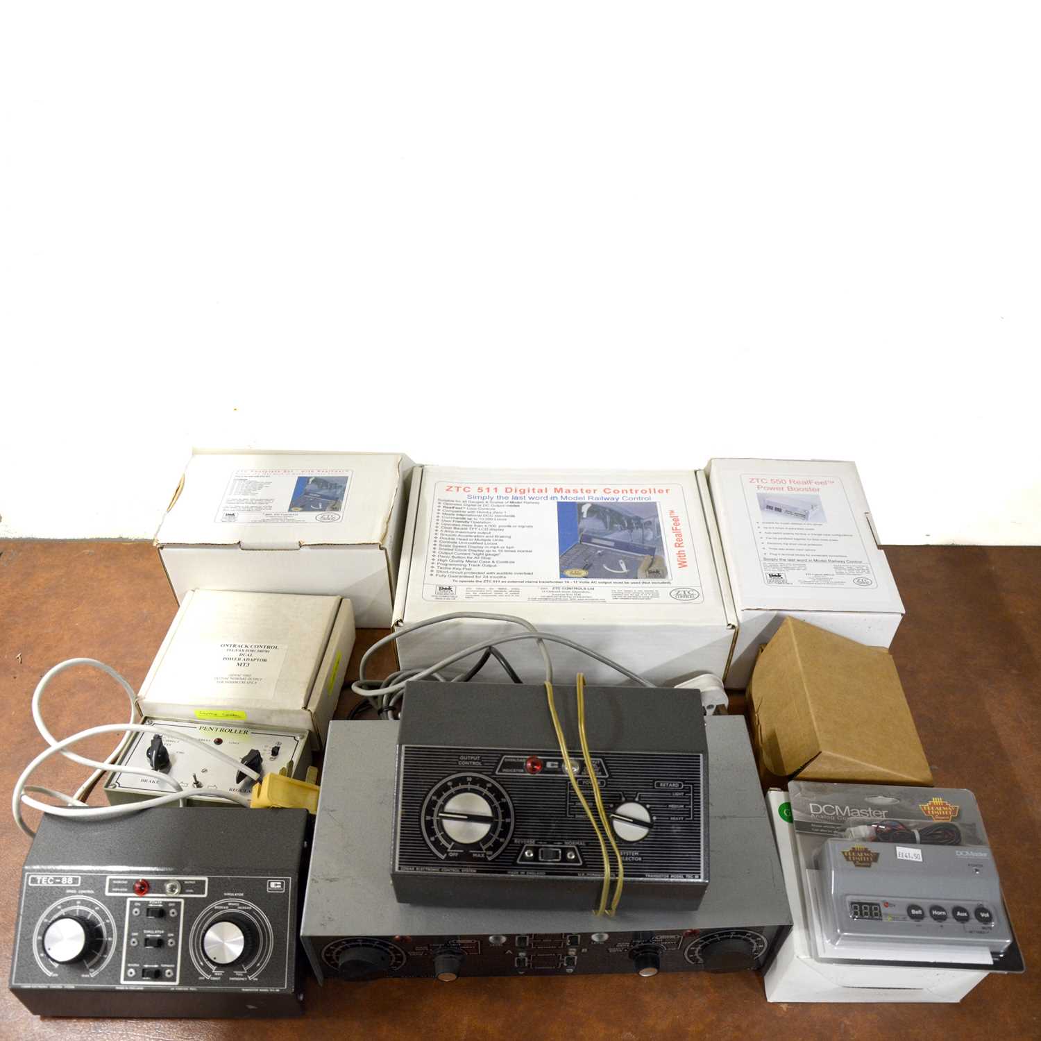 Lot 134 - Two boxes of model railway controllers and