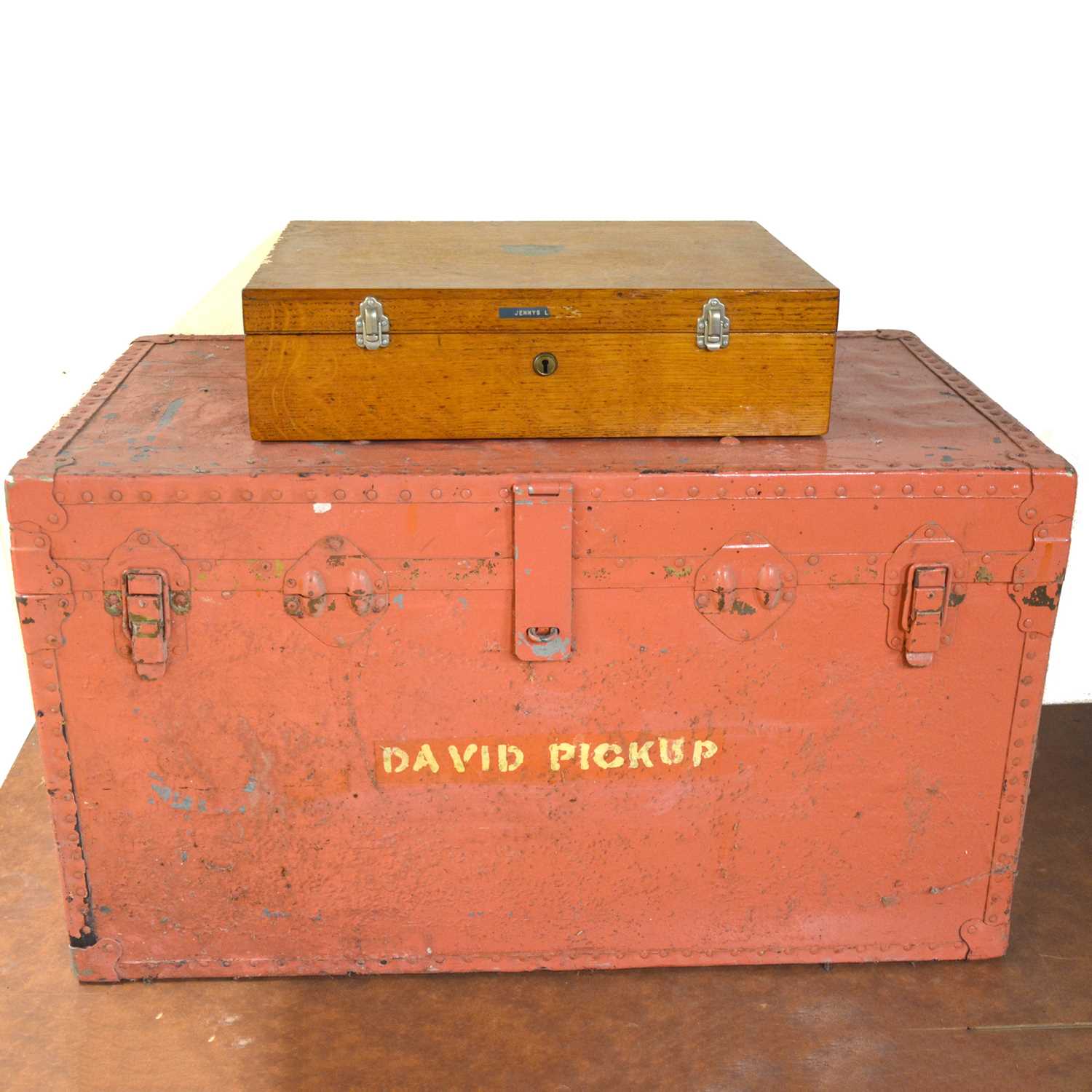 Lot 435 - A wooden storage case and red trunk