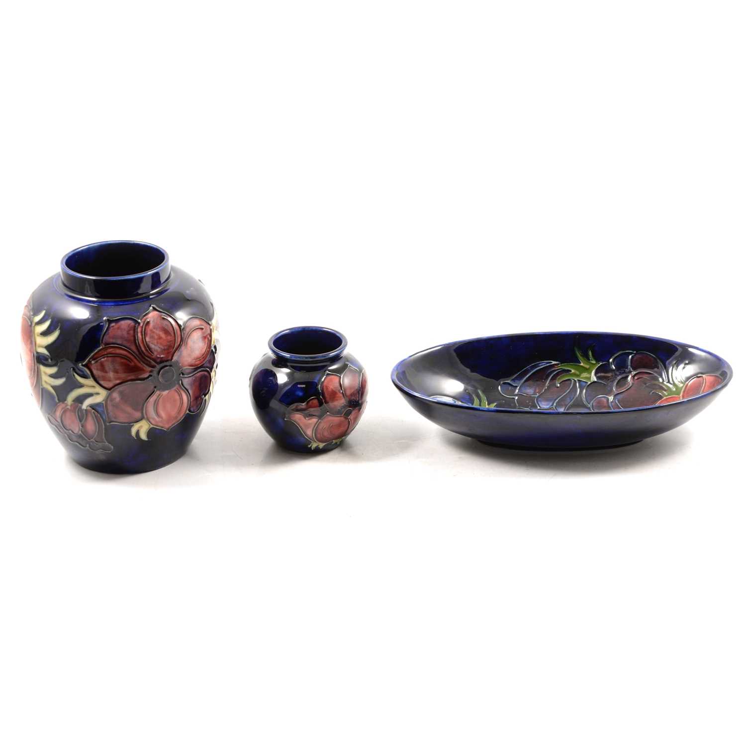 Lot 8 - Moorcroft Pottery - Anemone pattern ginger jar, small vase and dish.