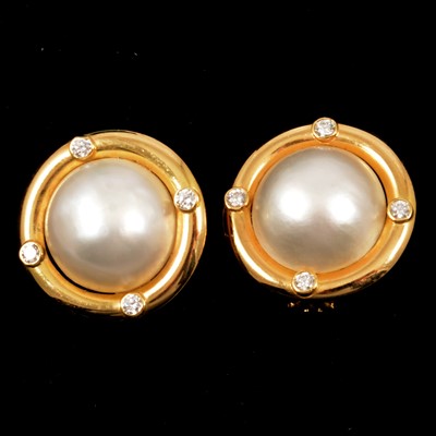 Lot 297 - A pair of 18 carat gold pearl and diamond earrings