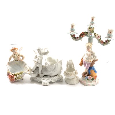 Lot 22 - Continental porcelain candelabra,  and three other cherub pieces