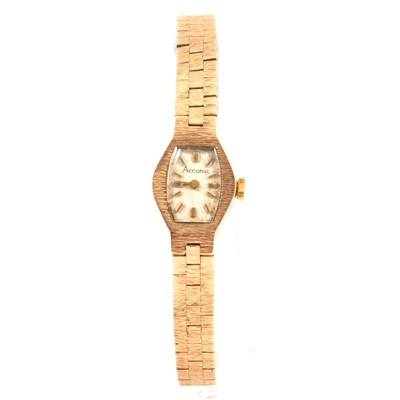 Lot 379 - Accurist - a lady's 9 carat yellow gold bracelet watch.