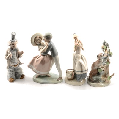 Lot 35 - Four Lladro figural groups, and two other similar