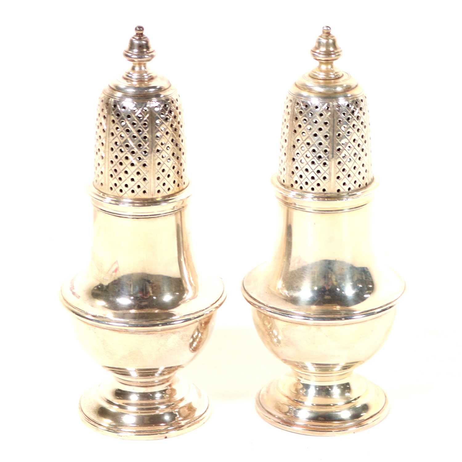 Lot 732 - Pair of silver sugar casters