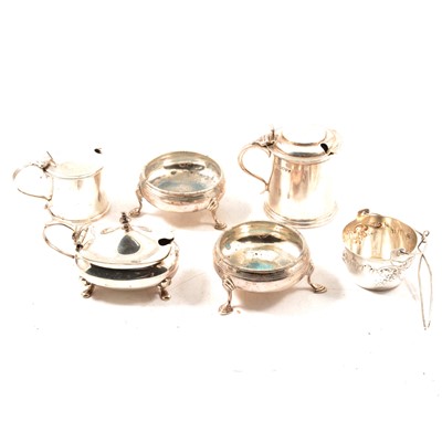 Lot 329 - A pair of silver salts, three mustard pots, tea strainer, smal silver dish, strainer