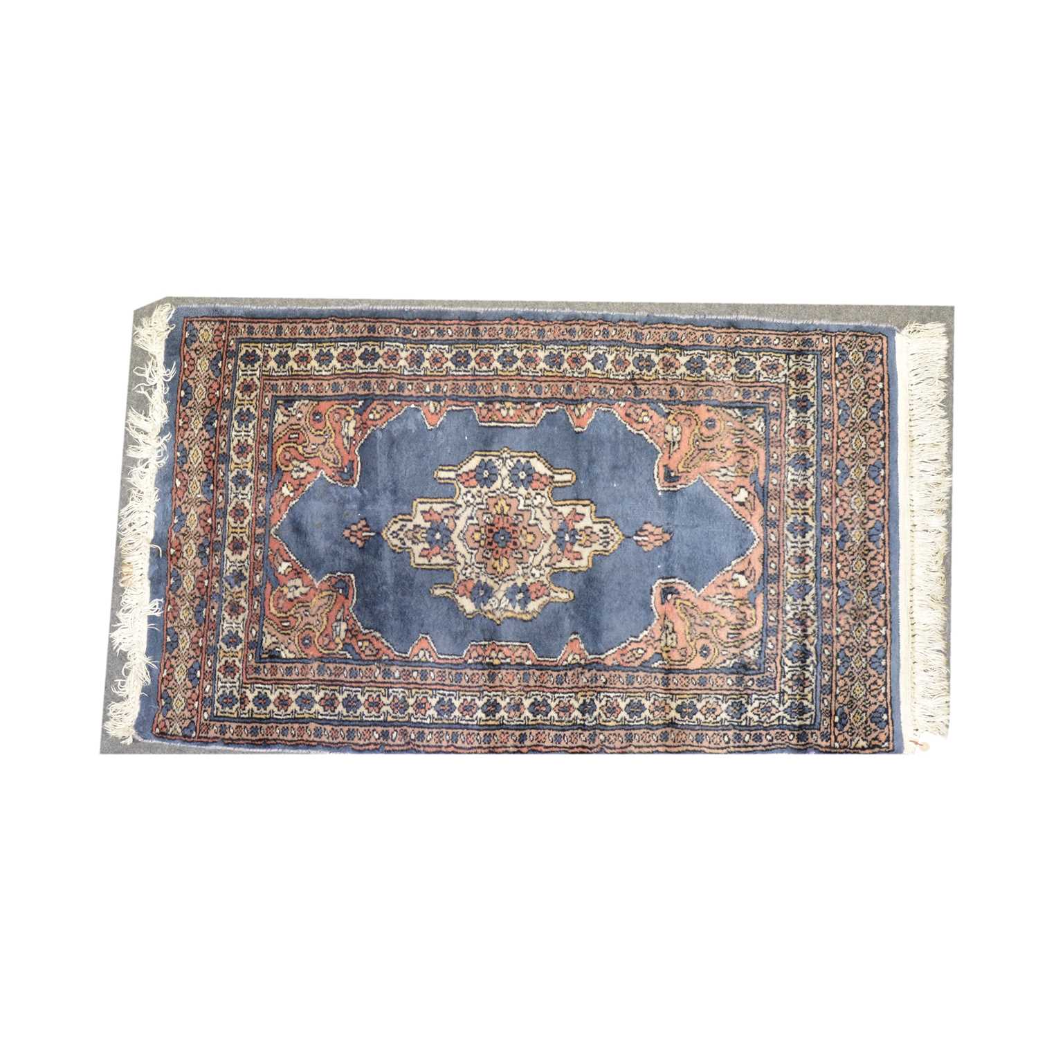 Lot 547 Four small modern rugs,