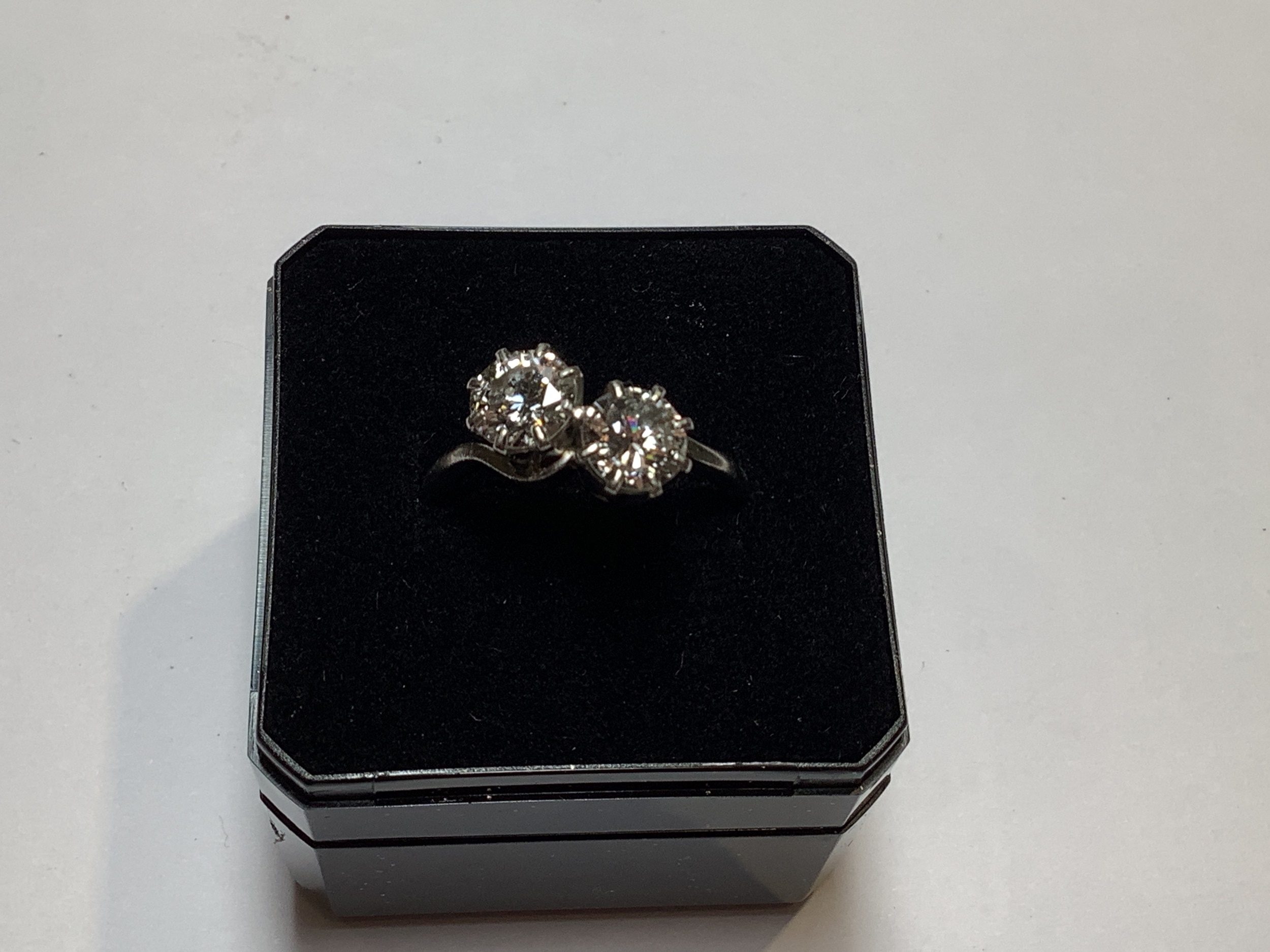 Lot 79 - A diamond two stone crossover ring