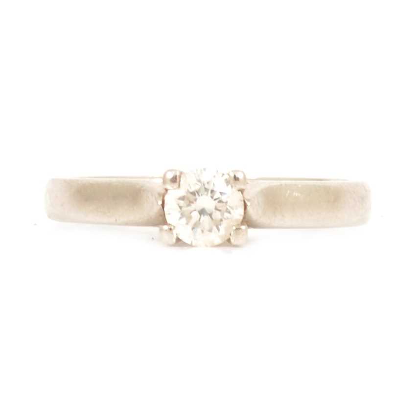 Lot 36 - A diamond solitaire ring.