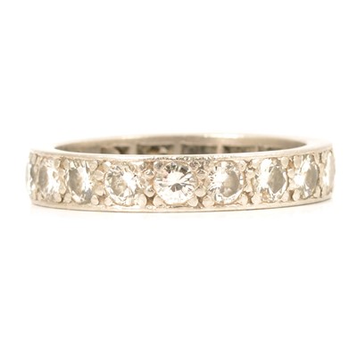 Lot 108 - A diamond full eternity ring.