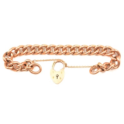 Lot 264 - A rose metal curb link bracelet.