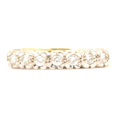 Lot 106 - A diamond half eternity ring.