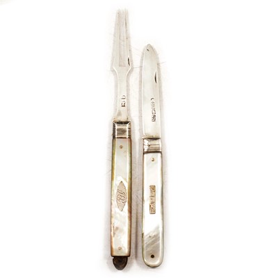 Lot 423 - A silver and mother of pearl fruit knife and fork.