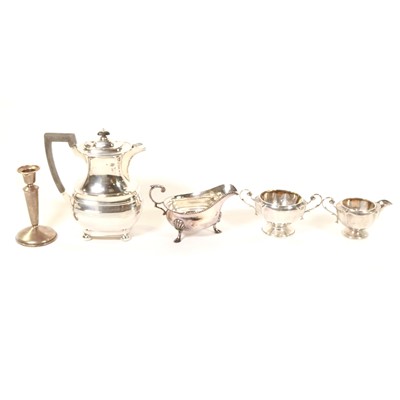 Lot 712 - Silver milk jug and sugar bowl, weighted silver candlestick, plated hot water jug and sauce boat.