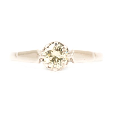 Lot 75 - A diamond solitaire ring.