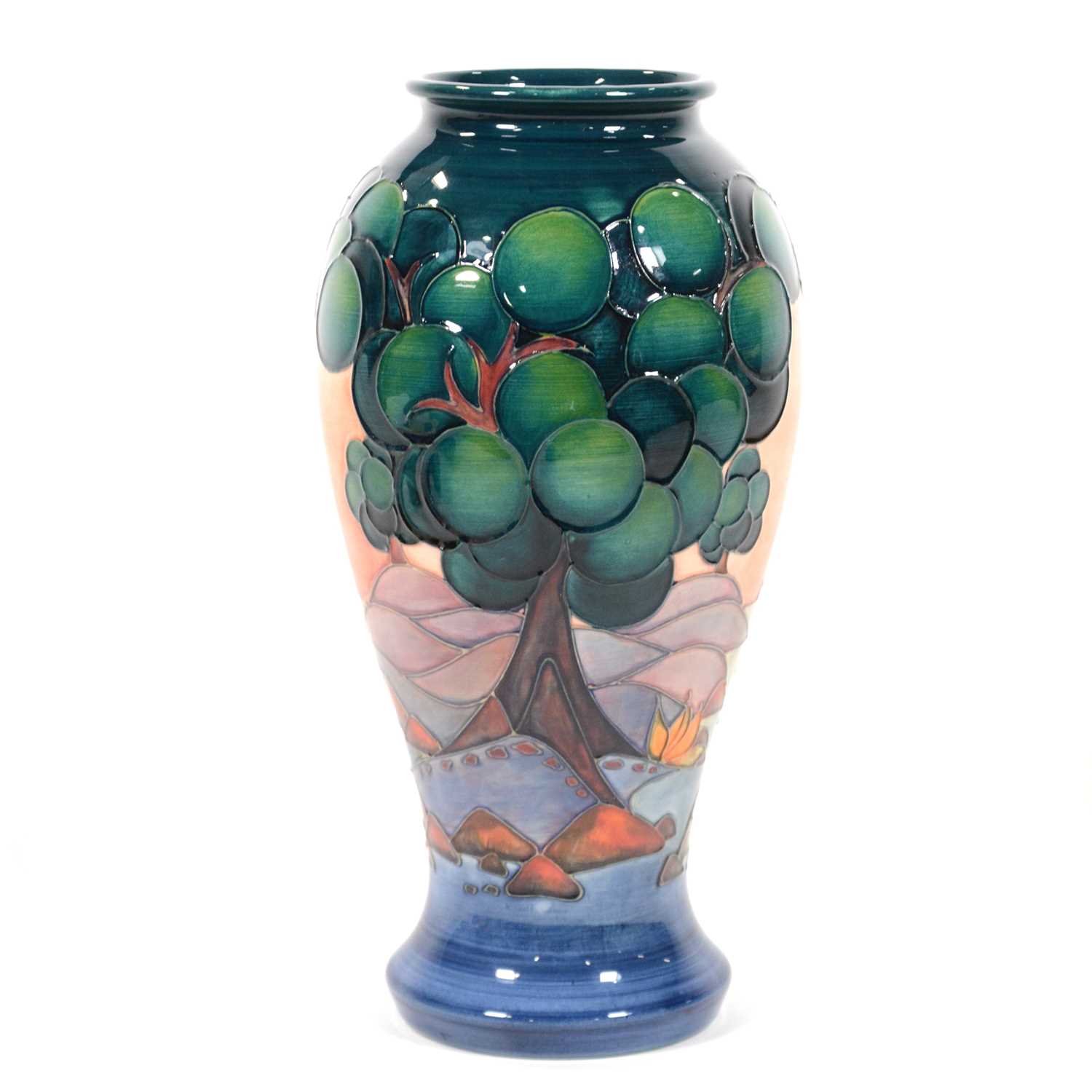 Lot 701 - Sally Tuffin for Moorcroft a baluster vase in the Mamoura landscape design.